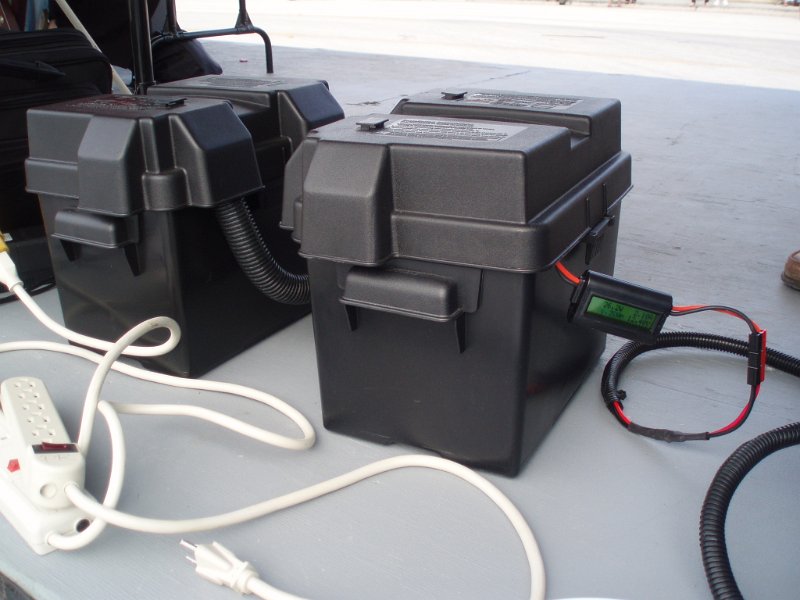 AGM_Battery.jpg - Pair of D34/78 AGM batteries, quick disconnect PowerPole 50A between batteries, twin 30A PowerPole connections for radio/charging, and WattMeter for monitoring load & usage.