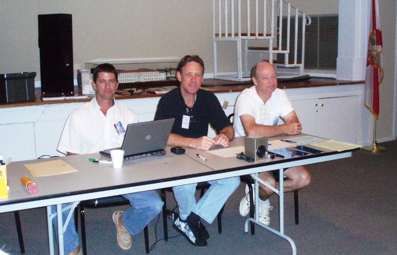 P8310046.JPG - Volunteer Examiners (VEs) ready to grade Technician tests at the American Red Cross in West Palm Beach, FL - 08/31/08. From the left:Kevin Jackson-W4JKJ, Rick Lucas - W4THI, Tim McDow-KM4EF.